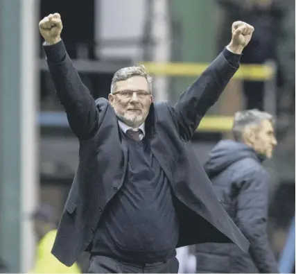  ??  ?? 0 Craig Levein celebrates Hearts’ 1-0 win at Easter Road on Saturday, his side’s third victory over Hibs in 2018.