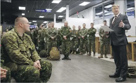  ?? IAN KUCERAK ?? Latvian ambassador Karlis Eihenbaums visited the Edmonton airport Friday to thank Canadian Army soldiers from 1 Canadian Mechanized Brigade Group who are deploying to Latvia.