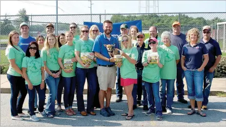  ?? Janelle Jessen/Herald-Leader ?? Simmons Pet Food kicked off its Dog Days of Summer Treat Giveaway at the Siloam Springs Animal Shelter on Tuesday.