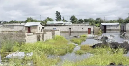  ??  ?? FILE PHOTO : Most of the flood victims lost their items when their houses collapsed in Bulangilil­o.