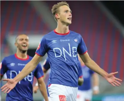  ?? GEIR OLSEN,W NTB SCANPIX ?? Magnus Rets Grødem i et lykkelig øyeblikk med Vålerenga, her har han scoret mot Tromsø på Intility Arena. Nå håper å plusse flere scoringer for Sandnes Ulf på ØsterHus Arena.