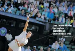  ?? Photo / AP ?? Ons Jabeur serves during her Wimbledon quarter-final win.