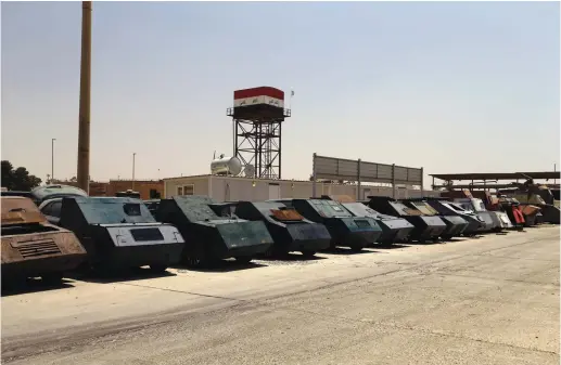  ??  ?? SPOILS OF war. Islamic State vehicles captured by the Iraqi army.