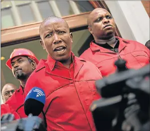  ?? Picture: AFP PHOTO/GIANLUIGI GUERCIA ?? FIERY AS EVER: EFF leader Julius Malema talks to the media after his party staged a walk-out during the election of the new president in parliament