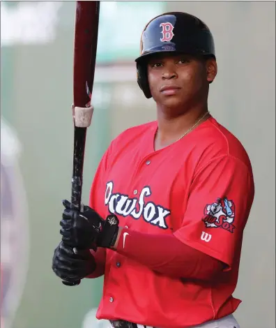  ?? Photo by Louriann Mardo-Zayat / lmzartwork­s.com ?? It's important to remember that Rafael Devers, who recently spent time on a rehab assignment with the Pawtucket Red Sox, won't turn 22 until next month. The youngster has had to grow up on the fly, yet as PawSox manager Kevin Boles recently noted, Devers is surrounded by quality people in the Red Sox clubhouse.