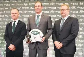  ?? Seth Wenig / Associated Press ?? From left, Jets owner Christophe­r Johnson, coach Adam Gase and general manager Mike Maccagnan during a news conference in Florham Park, N.J. on Jan. 14.