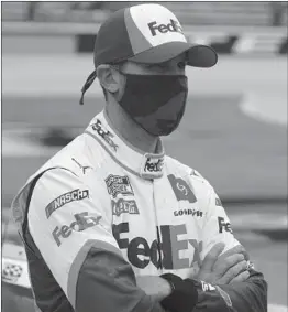  ?? RICHARDW. RODRIGUEZ/AP ?? Denny Hamlin waits on the grid before a NASCAR Cup Series auto race on Oct. 25 at Texas Motor Speedway in FortWorth, Texas.