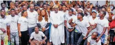  ?? ?? Lagos State Governor, Mr Babajide Sanwo- Olu ( middle), female talking drummer, Aralola Olamuyiwa a. k. a Ara, with beneficiar­ies of the “Eko Inspire Me” project by Ara, supported by the Lagos government, at Lagos House, Alausa, Ikeja