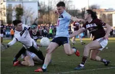  ?? Photos: Sportsfile and Inpho ?? Top, Kieran Molloy in action for Corofin at O’Connor Park in Tullamore and, above, for NUI Galway in the Sigerson Cup final in Santry.