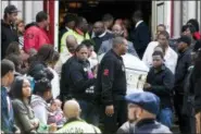  ?? JESSICA KOSCIELNIA­K/CHICAGO SUN-TIMES VIA AP ?? In this 2014 photo, the casket of Endia Martin is carried by pallbearer­s following funeral services for the 14-year-old at St. Andrew Temple Baptist Church in Chicago. Martin was killed by another 14-year-old in what started as a Facebook feud over a...