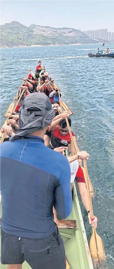  ??  ?? ghters, the city’s only dragon boat team composed of visually impaired paddlers and their sighted coaches, g last month.