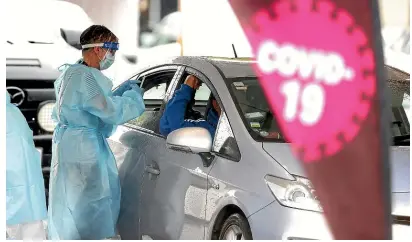  ?? GETTY IMAGES ?? A Covid-19 testing station in Otara Town Centre in Auckland this month.