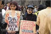  ?? VLADIMIR TRETYAKOV VIA AP ?? Women gather to mark Internatio­nal Women’s Day and to demand the adoption of a domestic violence law, in Kazakhstan, on Wednesday.