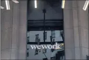  ?? ?? WeWork shares were issued at $10. The shares, under the ticker symbol WE, reached as high as $11.10 Thursday.