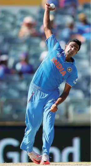  ??  ?? Protest: India’s Ravichandr­an Ashwin made his point by bowling with a Sunil Narine-style action in an Asia Cup game in 2014