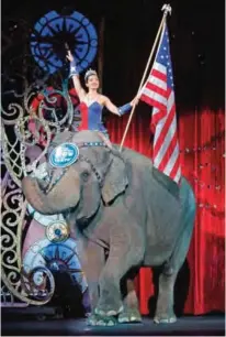 ??  ?? In this file photo, an Asian elephant performs during the national anthem for the final time in the Ringling Bros and Barnum & Bailey Circus in Providence, RI.