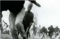  ?? Picture: Bill Krige ?? People flee for their lives in a hail of bullets during the Bhisho massacre.