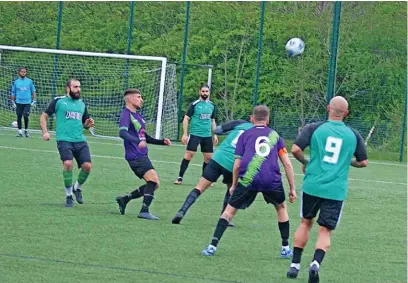  ?? ?? ●●Action from Babylon’s game against Dukinfield (Babylon in green and black)