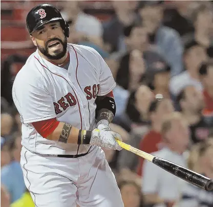  ?? STAFF PHOTO BY MATT STONE ?? LET IT OUT: Sandy Leon shows his frustratio­n after ending the eighth inning with a flyout last night at Fenway Park. Overall, the Red Sox offense was unable to come through in a 4-1 loss to the Twins.