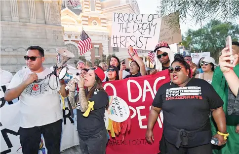  ??  ?? Immigrants and supporters chant outside the New York-New York Hotel and Casino on the Las Vegas Strip during a ‘We Rise for the Dream’ rally in Las Vegas, Nevada. — AFP photo