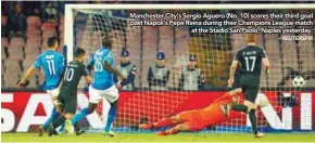  ?? – REUTERSPIX ?? Manchester City’s Sergio Aguero ( No. 10) scores their third goal past Napoli’s Pepe Reina during their Champions League match at the Stadio San Paolo, Naples yesterday.