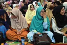  ??  ?? This photograph shows Indonesian women attending a religious lecture on marriage without dating at a mosque in Bekasi, on the eastern border of the capital Jakarta. — AFP photos