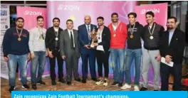  ??  ?? Zain recognizes Zain Football Tournament’s champions.