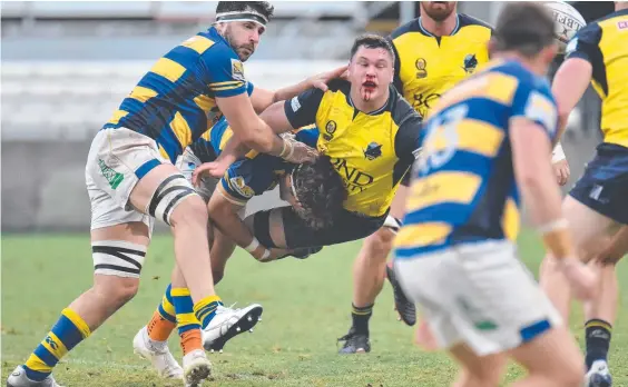  ??  ?? A bloodied and bruised Bond flanker Connor Pritchard in the preliminar­y final defeat to Easts. Picture: Stephen Tremain