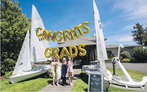  ?? DARREN STONE, TIMES COLONIST ?? Oak Bay High School grads, from left, Clara Donnachie-Parks, Rose Hanneson-Schwenger, Mya Hewstan-Gates and Molly Barkasy pose at a pop-up display at the Royal Victoria Yacht Club. It’s one of several pop-ups that students and parent created for the event.