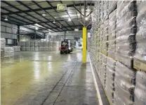  ?? PHOTO: ODT FILES ?? Barely changed . . . Milk powder prices rose just 0.1% at the latest global dairy trade auction; pictured, milk powder warehoused at Fonterra’s Edendale processing site in Southland.