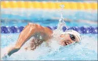  ?? Al Bello / Getty Images ?? Ridgefield’s Kieran Smith competes in heat five of the men’s 400-meter freestyle at the Tokyo Olympic Games at Tokyo Aquatics Centre on Saturday.