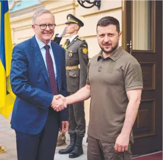  ?? ?? Prime Minister Anthony Albanese shakes hands with Ukraine President Volodymyr Zelensky before their meeting in Kyiv. Picture: AFP