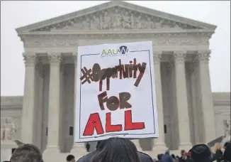  ?? Jacquelyn Martin Associated Press ?? A PROTEST during the 2015-16 Supreme Court term, when affirmativ­e action was last upheld.