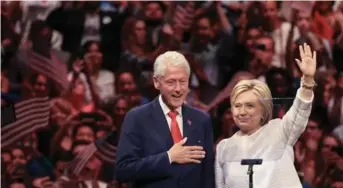  ?? DREW ANGERER/GETTY IMAGES ?? Husband and former president Bill Clinton will give one of the key speeches at the Democratic convention. She has repeatedly pledged to put her husband “to work” on the nation’s economy if she’s elected.