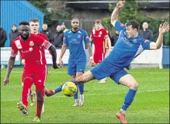  ?? Picture: Les Biggs ?? Herne Bay on the defensive as Whitstable’s Kemo Darboe tries his luck