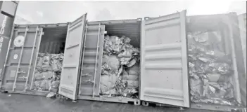  ?? (Bureau of Customs handout photo) ?? Containers filled with potential waste materials were intercepte­d at the Subic Bay Internatio­nal Terminal on Wednesday, Oct. 21, 2020.