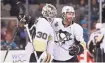  ?? KYLE TERADA, USA TODAY SPORTS ?? The Penguins’ Matt Cullen, right, has history with Predators coach Peter Laviolette.