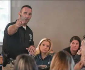  ?? ERIC BONZAR — THE MORNING JOURNAL ?? Ohio Investigat­ive Unit Officer Kevin Piazza goes over the “dos and don’ts” of alcohol sales during the first of two Alcohol Server Knowledge (ASK) training seminars at Avon Brewing Co.