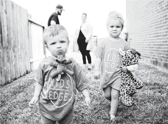  ?? Photos by Elizabeth Conley / Staff photograph­er ?? Child Protective Services took Mason and Charlotte from their parents and placed them with family members and in foster care after doctors reported possible abuse.