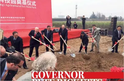  ?? COURTESY OF THE GOVERNOR’S OFFICE OF NEBRASKA ?? Nebraska Governor Pete Ricketts (center) joins officials from Shaanxi provincial government and the Administra­tion Committee of Yangling Agricultur­al High-Tech Industries Demonstrat­ion Zone in November 2016 to break ground for the Nebraska (Yangling)...
