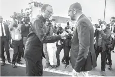  ??  ?? Kagame (left) welcomes Michel who will attend the 25th Commemorat­ion of the 1994 Genocide against the Tutsi at Kigali internatio­nal airport in Kigali, Rwanda. — AFP photo