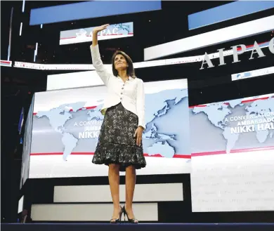  ?? (Joshua Roberts/Reuters) ?? US AMBASSADOR to the United Nations NIkki Haley waves as she arrives to speak to the American Israel Public Affairs Committee (AIPAC) policy conference in Washington, on Monday.