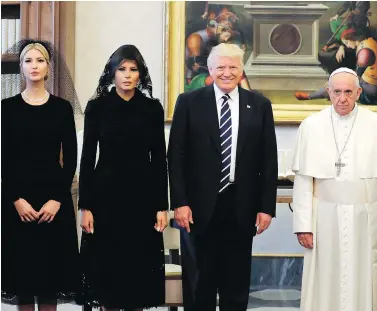  ?? EVAN VUCCI / AFP / GETTY IMAGES ?? Ivanka Trump, left, First Lady Melania Trump, U.S. President Donald Trump and Pope Francis pose for photograph­s Wednesday at the Vatican during the American presidenti­al family’s visit.