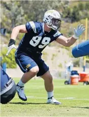  ?? GREGORY BULL/AP ?? San Diego Chargers rookie defensive end Joey Bosa, here during a practice back in June, has ended his holdout.