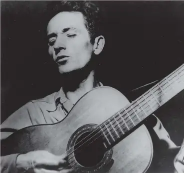  ??  ?? 0 Woody Guthrie sang about the racism of the current US President’s father Fred