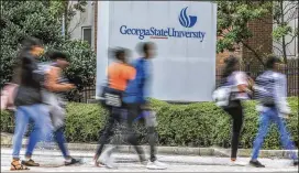  ??  ?? Students want to return to their classrooms in the fall, and Georgia public colleges are planning to do so at this point. But the chancellor said the resumption of face-to-face classes is contingent on the guidance of state health officials.