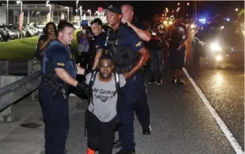  ?? MAX BECHERER/THE ASSOCIATED PRESS FILE PHOTO ?? Activist DeRay Mckesson, being arrested during a protest over the fatal shooting by police officers of Alton Sterling in Baton Rouge, La., in 2016, is leading a campaign to refocus Black Lives Matter’s efforts on state capitols.