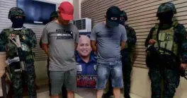  ?? —LYNRILLON ?? Twoof the 11 Malabon policemen tagged in the kidnap-forransom complaint—P03 Bernardino Pacoma and SPO3 Jerry dela Torre—are presented in Camp Crame on Saturday.