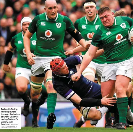  ?? BRENDAN MORAN/SPORTSFILE ?? Ireland’s Tadhg Furlong bursts through the tackle of Grant Gilchrist during Ireland’s victory over Scotland