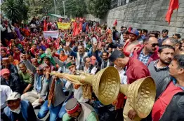  ?? — PTI ?? Kisan Sabha activists raise slogans as they gherao the Vidhan Sabha over their demands in Shimla on Tuesday.